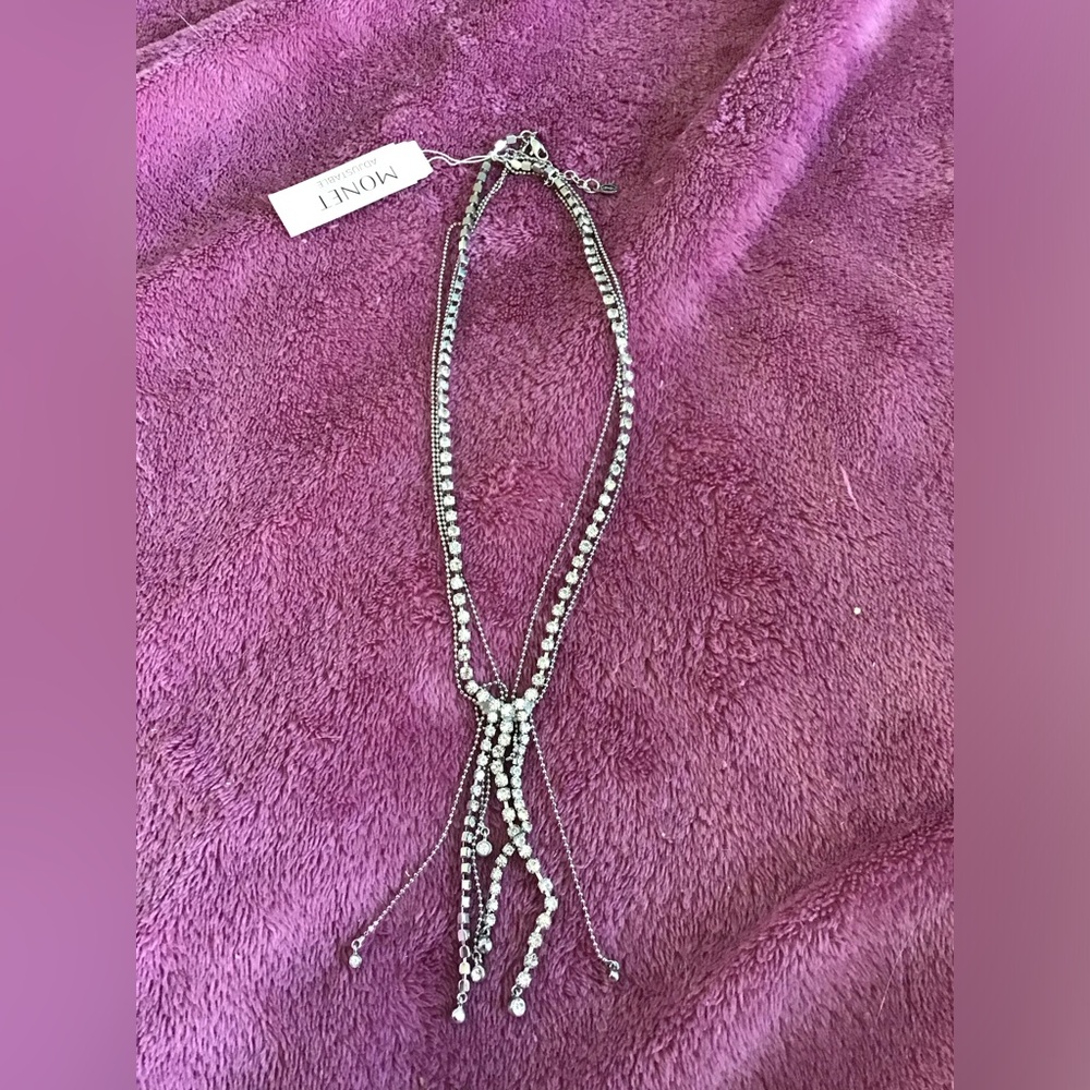Swarovsky crystals in silver necklace with adjustable multi chain inserts. NWT